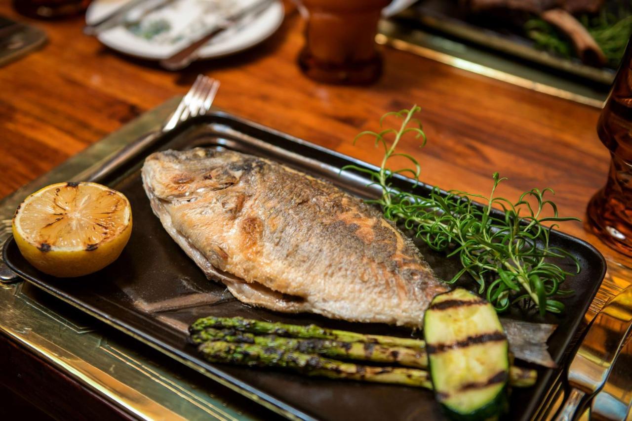 Radisson Blu Hotel, Kuwait Kuwait City Exterior photo Grilled turbot